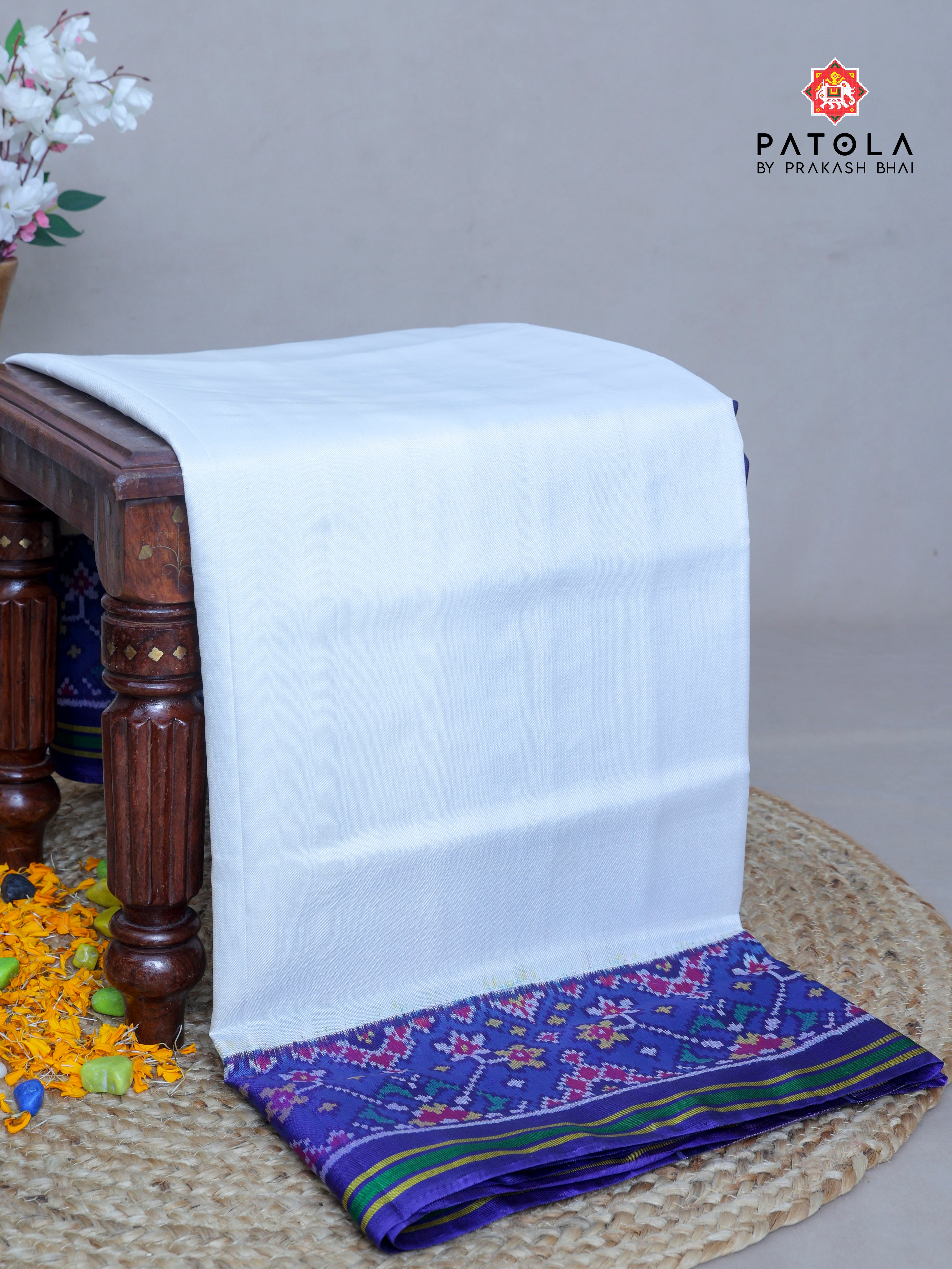 Plain White With Navratna Border Semi Double Ikat Patola Saree